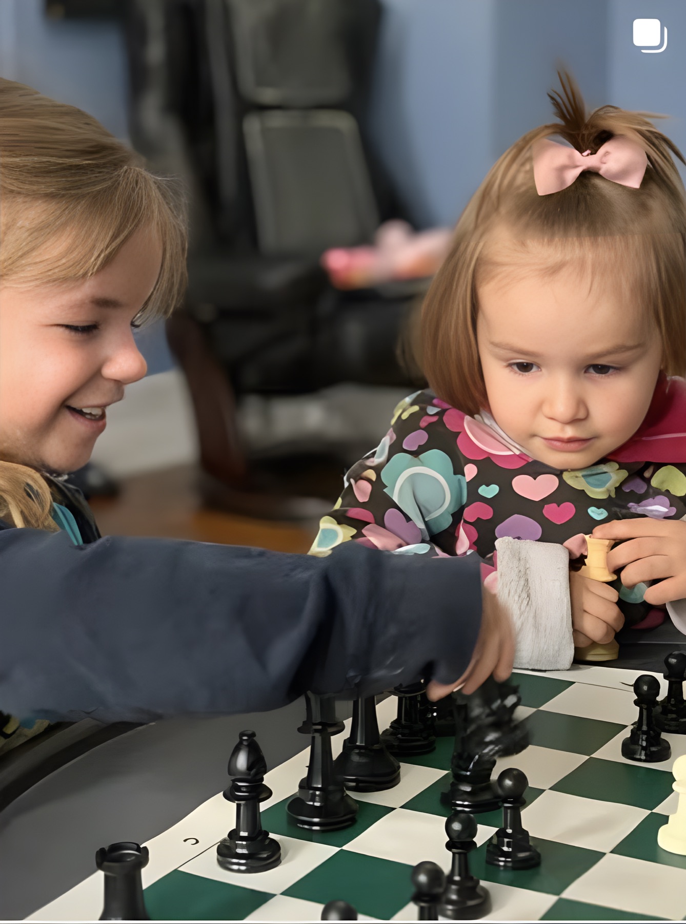 Students playing chess in an after-school program